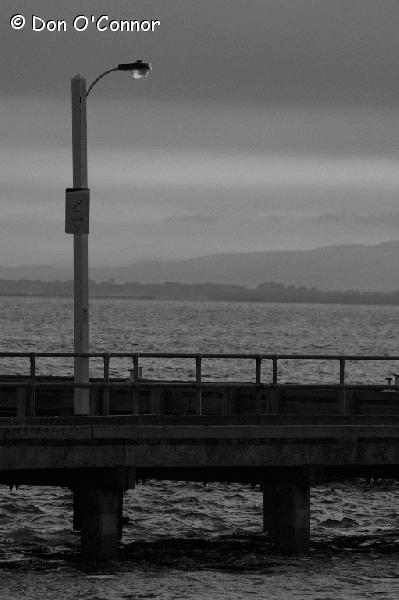 Lamp post and jetty.